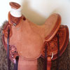 Half tooled Vaquero Lace with Daffodil flower Wade Saddle      
built on a 94 degree bar that fits a well built muscular shoulders -
The seat is finished at 15 & 1/2 inch with a close contact deep pocket fit -
Gullet is 7 & 1/2 inch height by 6 & 1/2 width with the back hand hole width at 4 inch -
Horn is 6 inch height by 5 and 1/2 inch width Guadalajara at 31 degree pitch - Cantle is 4 and 1/2 inch in height by 12 & 1/2 in width with a Cheyenne roll - Flat plate riggin at 7/8ths
- leather lined 5 inch Stainless Steel Moran Stirrups . 